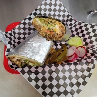 Super burrito wrapped and sliced in half