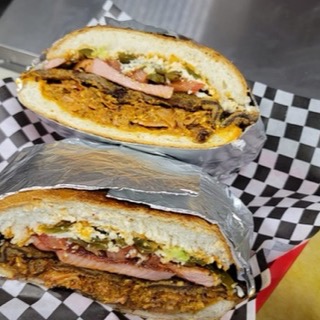 Torta Milaneza with breaded steak, cheese and jalapeño